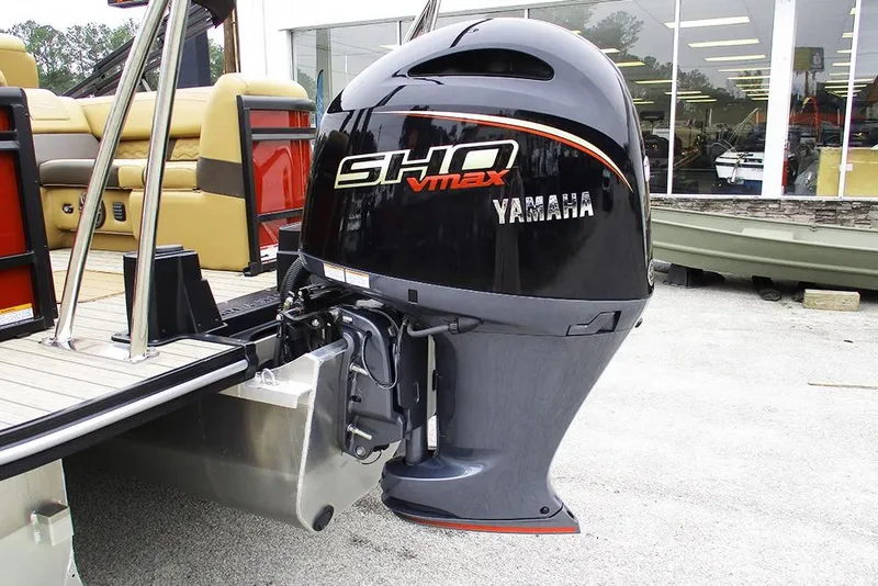 Slide: The Image of SunCatcher Fusion 322RC 2026 with Yamaha SHO VMAX outboard motor, docked at a marina. - 9