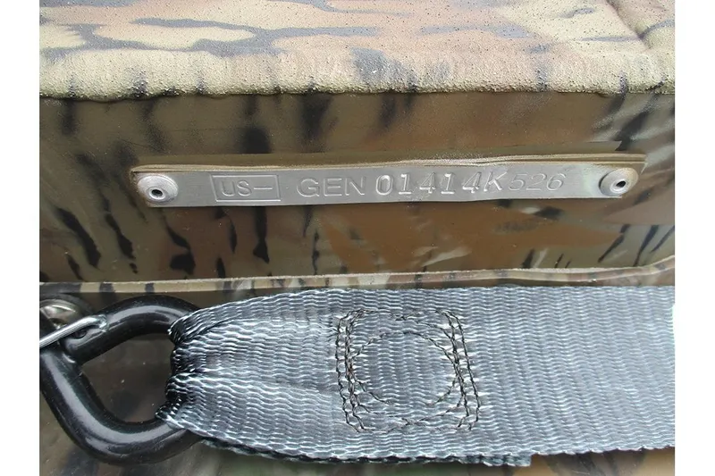 Slide: The Image of 2026 G3 Gator Tough 16 DK boat with camouflage pattern and metal identification plate. - 16