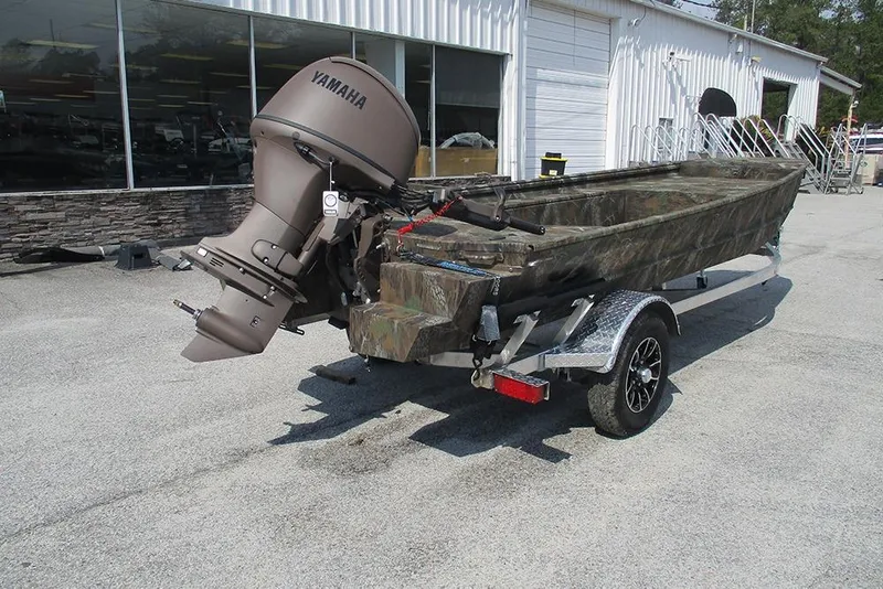 Slide: The Image of 2026 G3 Gator Tough 16 DK boat with Yamaha outboard motor on trailer. - 6