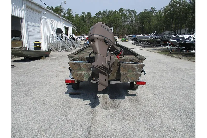 Slide: The Image of 2026 G3 Gator Tough 16 DK boat with Yamaha motor in a dealership lot. - 7