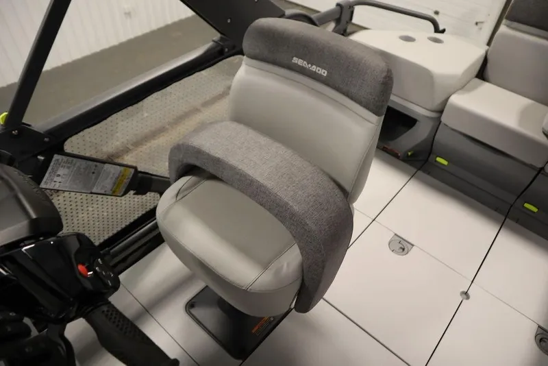 Slide: The Image of 2024 Sea-Doo Switch Cruise 21 interior with comfortable seating and modern design. - 30