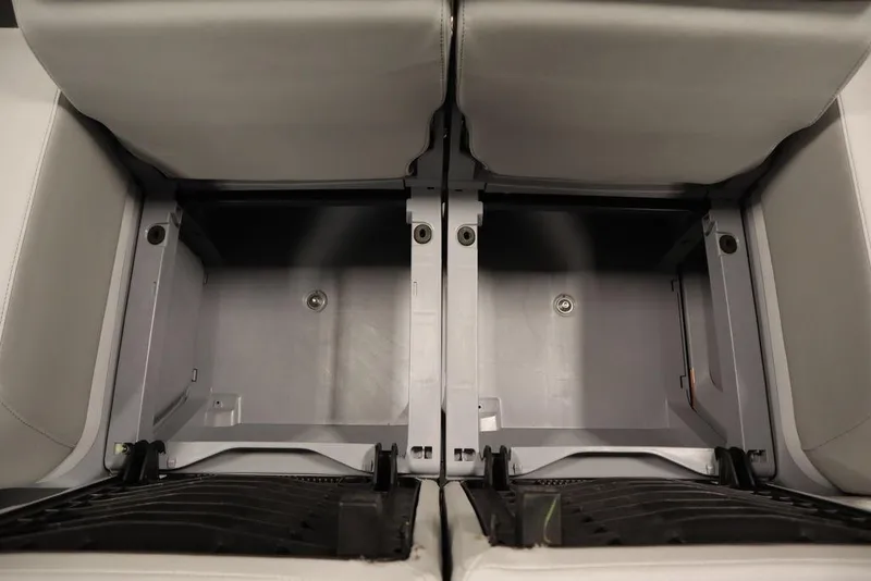 Slide: The Image of 2024 Sea-Doo Switch Cruise 21 under-seat storage compartment, showcasing spacious design. - 33