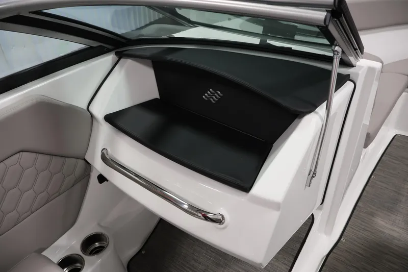 Slide: The Image of Interior of 2026 Four Winns H1 OB boat, featuring sleek design and modern amenities. - 25