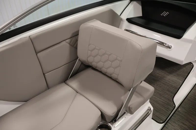 Slide: The Image of 2026 Four Winns H1 OB boat interior with beige seating and modern design. - 29