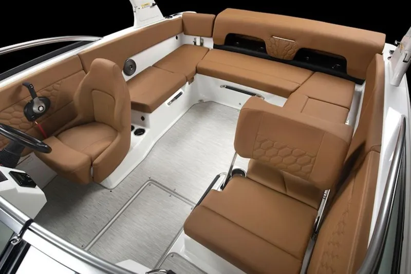 Slide: The Image of 2026 Four Winns H1 OB boat interior with brown seating and modern design. - 3