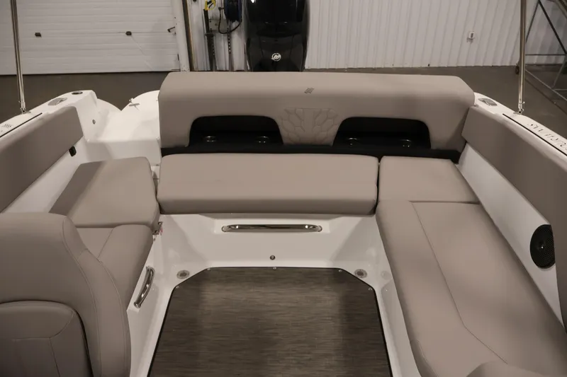 Slide: The Image of 2026 Four Winns H1 OB boat interior with beige seating and modern design. - 30