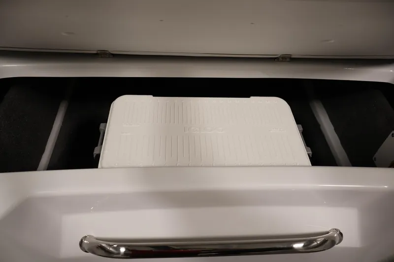 Slide: The Image of Storage compartment with cooler in 2026 Four Winns H1 OB boat. - 32