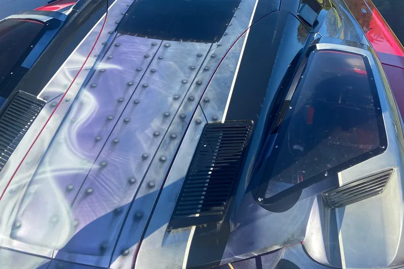 Slide: The Image of 2007 Nor-Tech 4700 Super Cat with custom paint and sleek design details. - 10