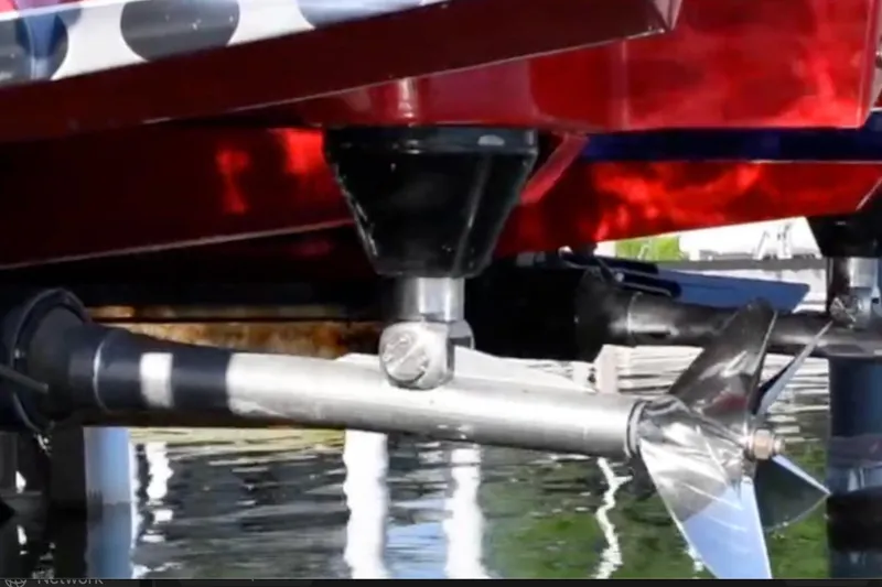 Slide: The Image of Close-up of 2007 Nor-Tech 4700 Super Cat boat propeller in water. - 20