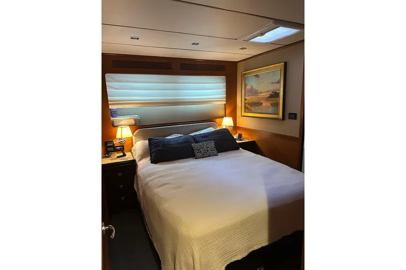 Slide: The Image of Luxurious bedroom interior of 2016 Nordhavn 60 yacht with cozy bedding and elegant decor. - 14