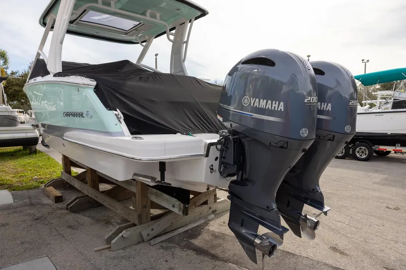 Slide: The Image of 2021 Chaparral 280 OSX boat with twin Yamaha 200 engines on display. - 5