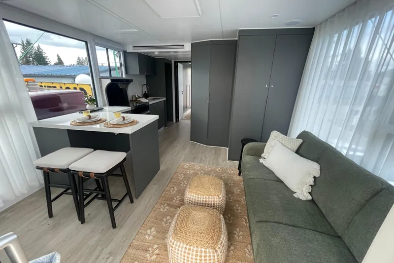 Slide: The Image of Modern 2025 Houseboat ALLHOUSE HB-1250 interior with cozy living area and kitchen. - 15