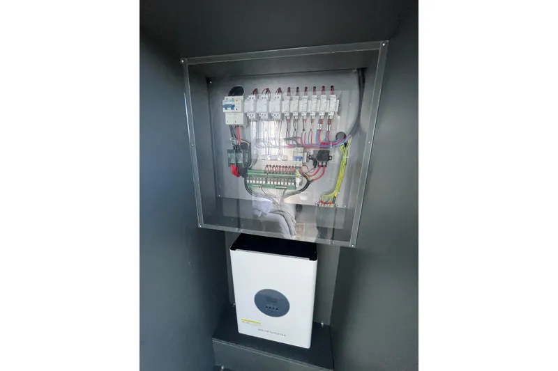 Slide: The Image of Electrical panel and battery system in 2025 Houseboat ALLHOUSE HB-1250. - 17