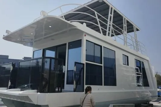 Slide: The Image of Modern 2025 custom houseboat with sleek design and spacious upper deck. - 24