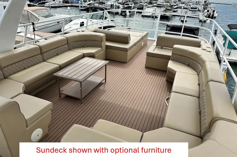 Slide: The Image of Luxurious 2025 custom houseboat sundeck with optional beige furniture and wooden flooring. - 26