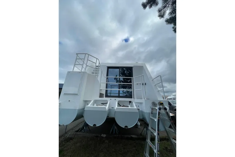 Slide: The Image of Modern 2025 ALLHOUSE HB-1250 houseboat with sleek design and spacious deck. - 3