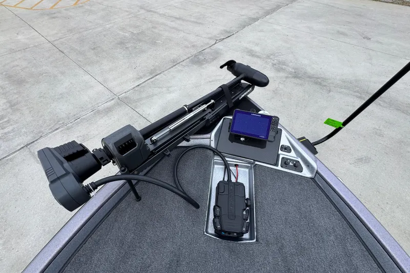 Slide: The Image of 2023 Phoenix 21 PHX boat deck with trolling motor and navigation system. - 19