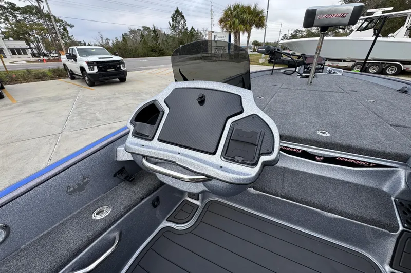 Slide: The Image of 2023 Phoenix 21 PHX boat dashboard with modern controls and spacious deck. - 30