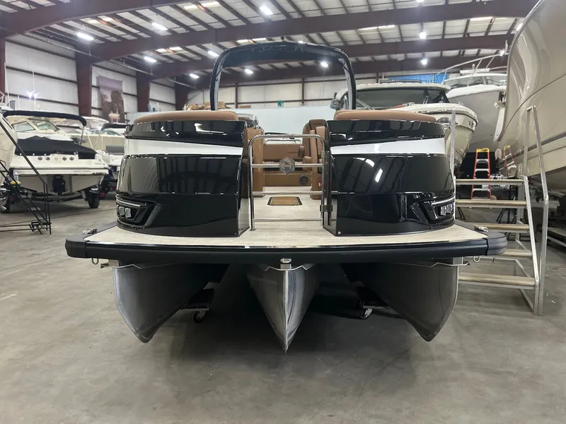 Slide: The Image of 2025 Harris Grand Mariner 250 pontoon boat in warehouse. - 22