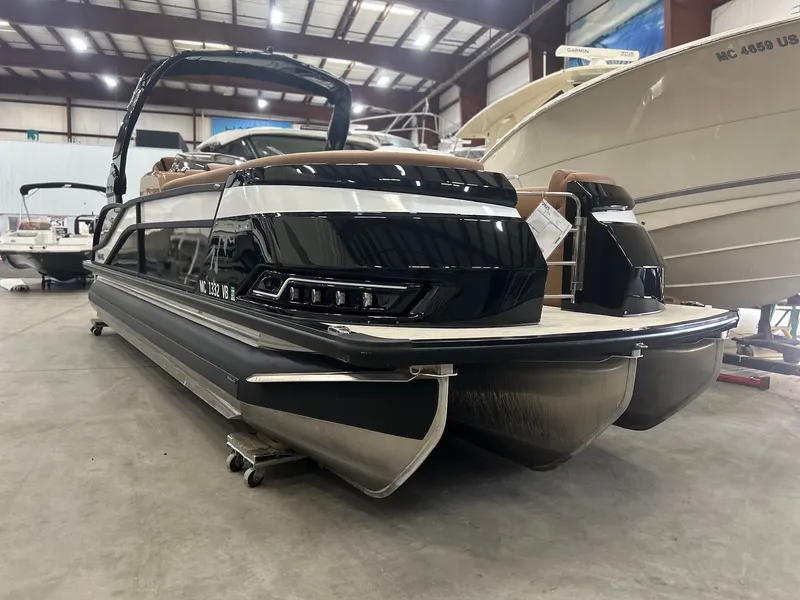 Slide: The Image of 2025 Harris Grand Mariner 250 pontoon boat in warehouse. - 26