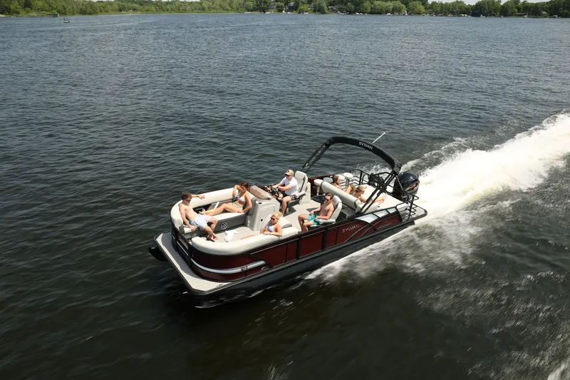 The Image of Sylvan Mirage X3 DLZ DH Bar 2026 on a lake with passengers. - 0