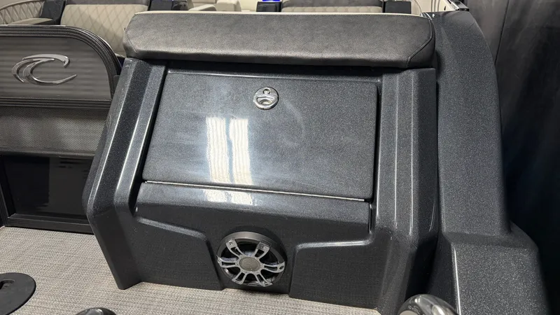 Slide: The Image of 2018 Crest Caribbean boat with speaker and storage compartment. - 17
