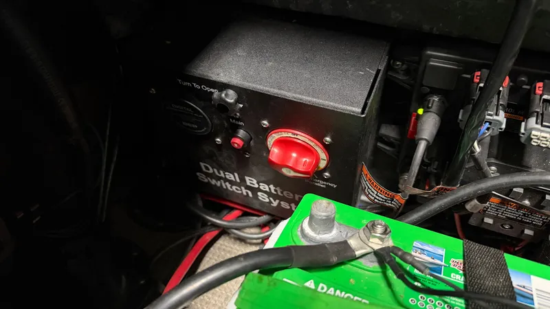 Slide: The Image of Dual battery switch system in a 2018 Crest Caribbean boat. - 25