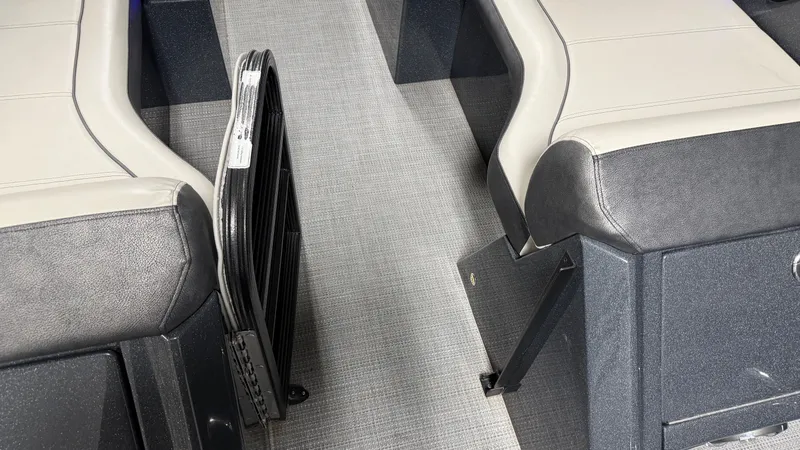 Slide: The Image of Interior of a 2018 Crest Caribbean boat with gray seating. - 29