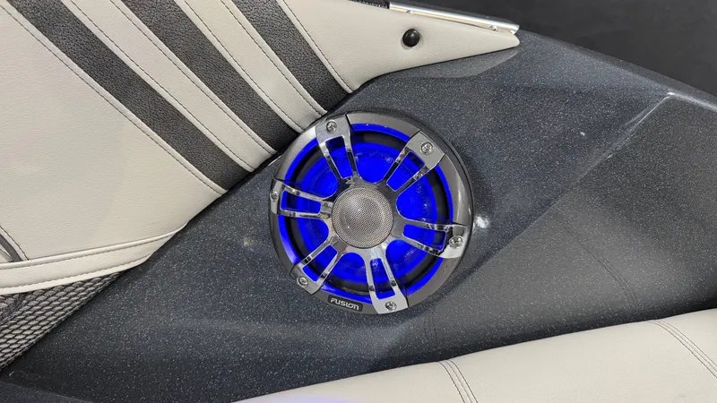 Slide: The Image of Speaker with blue lighting in a 2018 Crest Caribbean. - 34