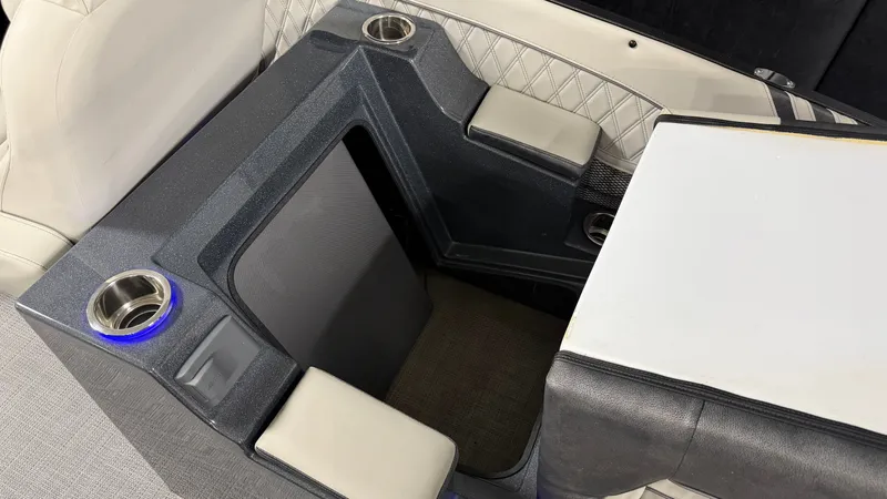 Slide: The Image of Interior of a 2018 Crest Caribbean with cup holders. - 36
