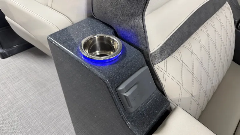 Slide: The Image of Illuminated cup holder in a 2018 Crest Caribbean boat. - 38