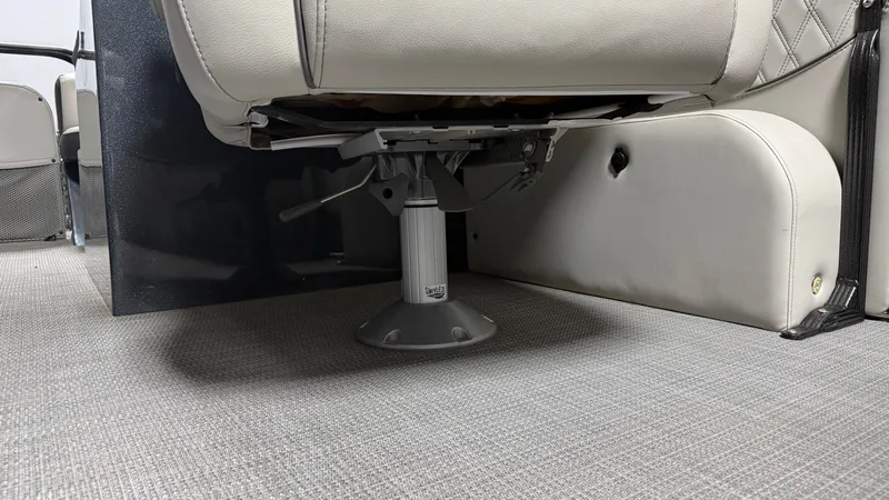 Slide: The Image of Crest Caribbean 2018 boat seat with gray carpet flooring. - 48