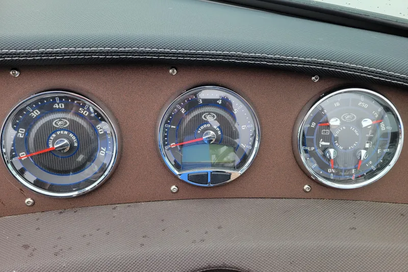 Slide: The Image of Dashboard of a 2019 Cobalt CS22 boat with speedometer and gauges. - 10