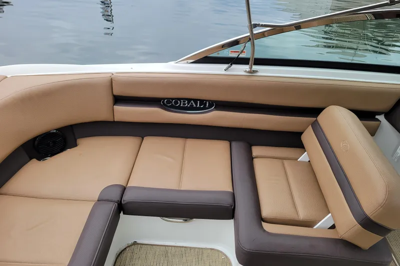 Slide: The Image of Luxurious interior of 2019 Cobalt CS22 boat with tan leather seating. - 21