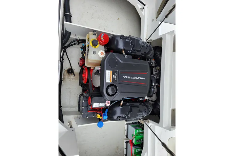 Slide: The Image of 2019 Cobalt CS22 boat engine compartment with Volvo Penta engine. - 26