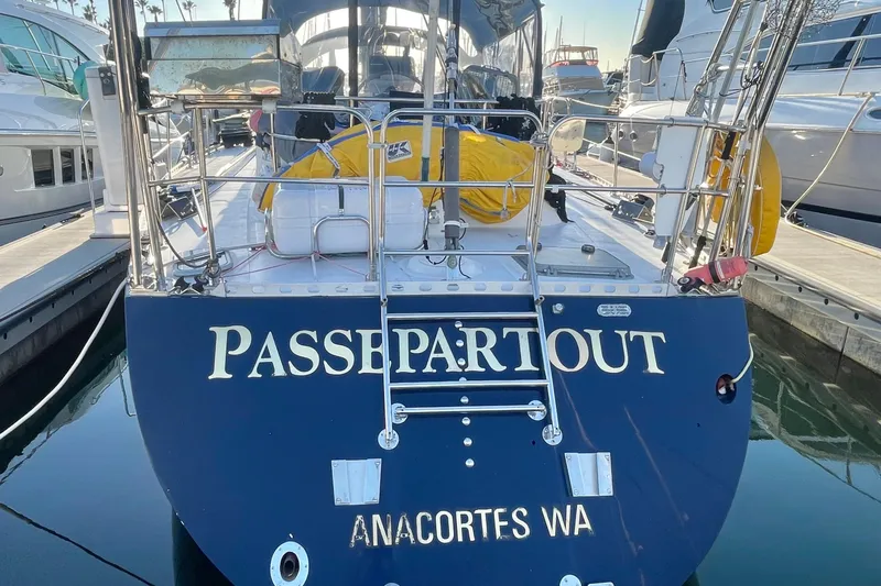 Slide: The Image of 1982 Stevens cutter sailboat "Passepartout" docked in Anacortes, WA marina. - 2