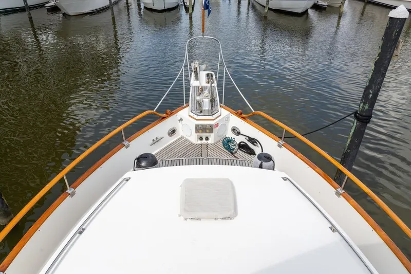 Slide: The Image of Grand Banks 46 Motoryacht 1993, teak deck and polished metal fittings detail. - 24