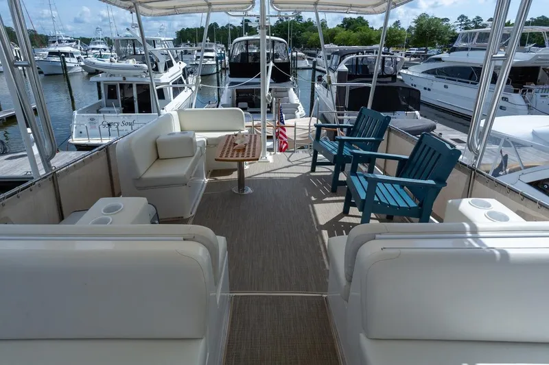 Slide: The Image of Bow view of 1993 Grand Banks 46 Motoryacht docked at marina. - 34