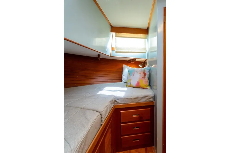 Slide: The Image of Laundry area in 1993 Grand Banks 46 Motoryacht with wooden louvered doors. - 47
