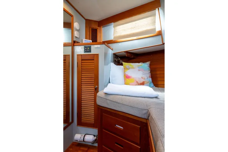 Slide: The Image of 1993 Grand Banks 46 Motoryacht galley with wood cabinetry and modern appliances. - 49
