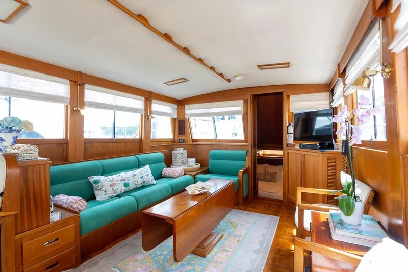 Slide: The Image of Interior of 1993 Grand Banks 46 Motoryacht with wooden decor and comfortable seating. - 61