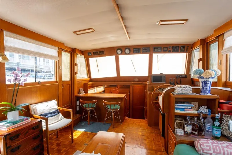 Slide: The Image of Luxurious cabin interior of 1993 Grand Banks 46 Motoryacht with elegant wood finish. - 64