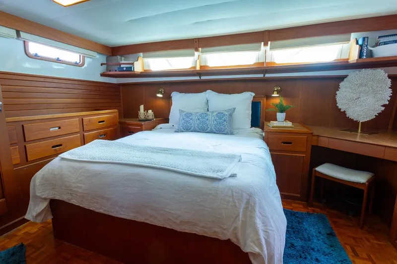 Slide: The Image of Interior of 1993 Grand Banks 46 Motoryacht with wooden cabinetry and cozy furnishings. - 65
