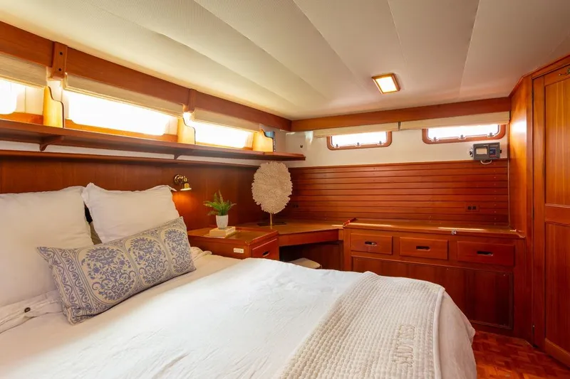 Slide: The Image of 1993 Grand Banks 46 Motoryacht bathroom with wooden cabinetry and modern fixtures. - 67