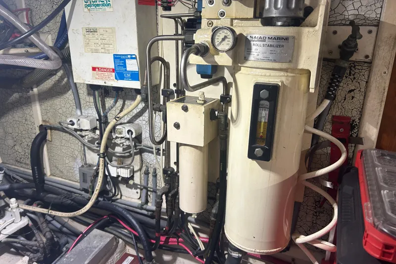 Slide: The Image of Engine room of 1993 Grand Banks 46 Motoryacht with Naiad Marine roll stabilizer system. - 72