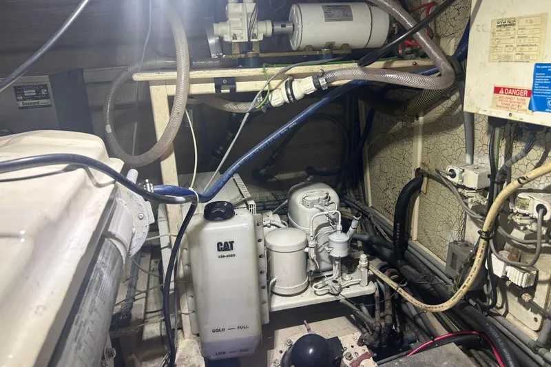 Slide: The Image of Engine room of 1993 Grand Banks 46 Motoryacht with CAT components and wiring. - 73