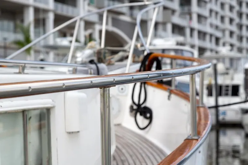 Slide: The Image of Grand Banks 46 Motoryacht 1993, teak deck detail with engraved nameplate. - 9