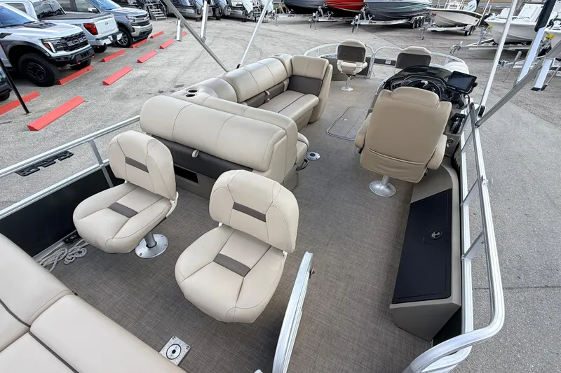 Slide: The Image of 2022 Sun Tracker Fishin' Barge 22 DLX with spacious seating and modern design. - 11