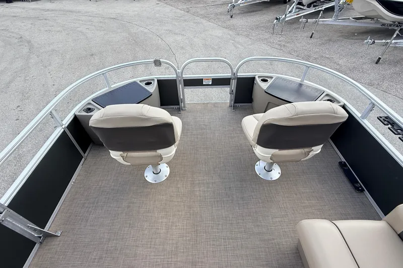 Slide: The Image of 2022 Sun Tracker Fishin' Barge 22 DLX with swivel seats and spacious deck. - 12