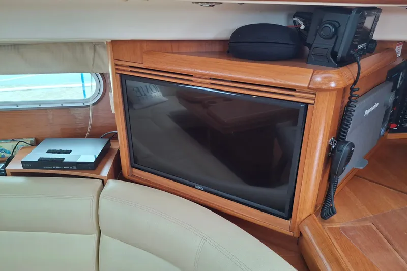 Slide: The Image of Cockpit of 2009 Jeanneau Sun Odyssey 54 DS yacht in marina setting. - 10